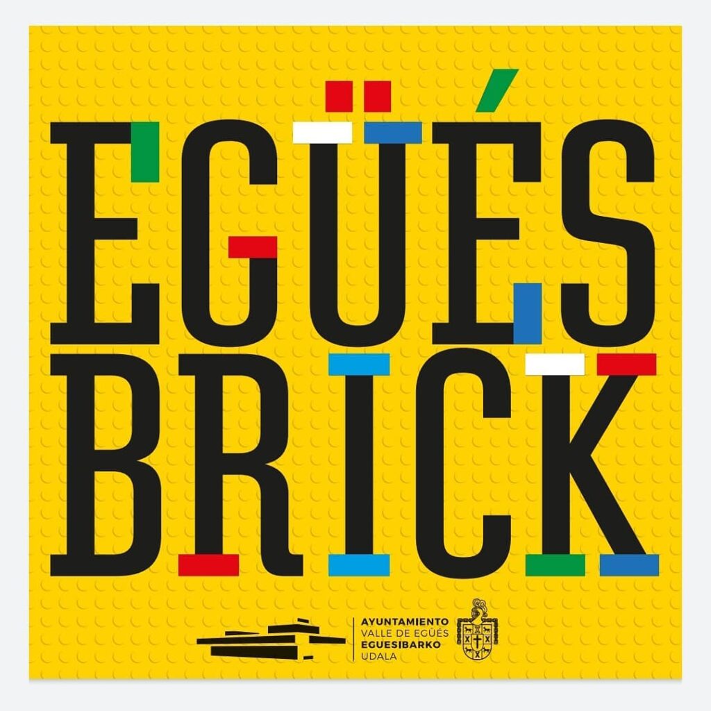 cartel EGÜÉSBRICK EXPOSICIÓN LEGO EN ESCAPARATES